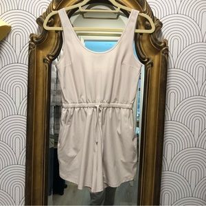 Abercrombie // sleeveless traveler romper in bone light beige